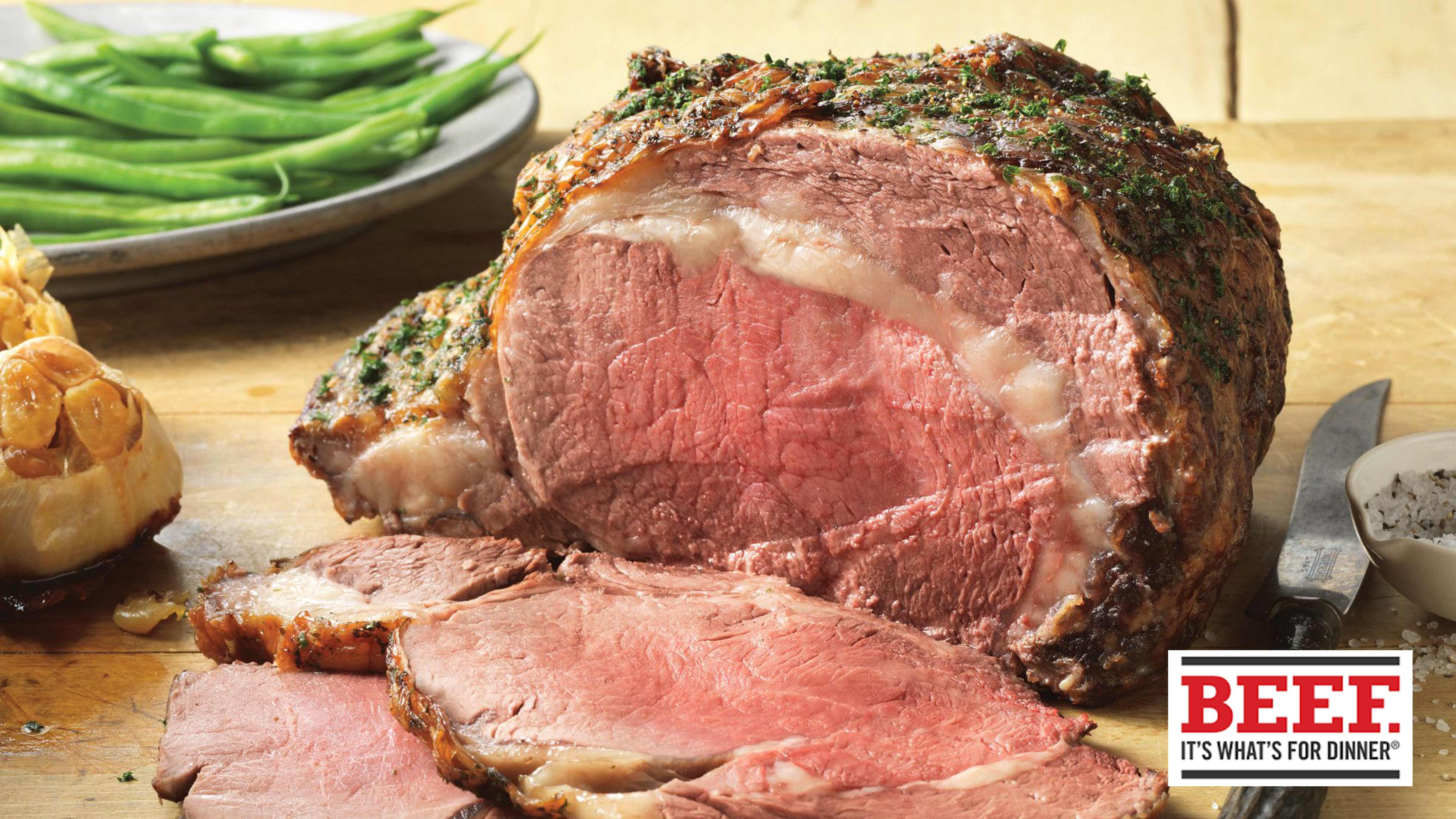 Image for Recipe Peppered Rib Roast with Roasted Garlic Sauce